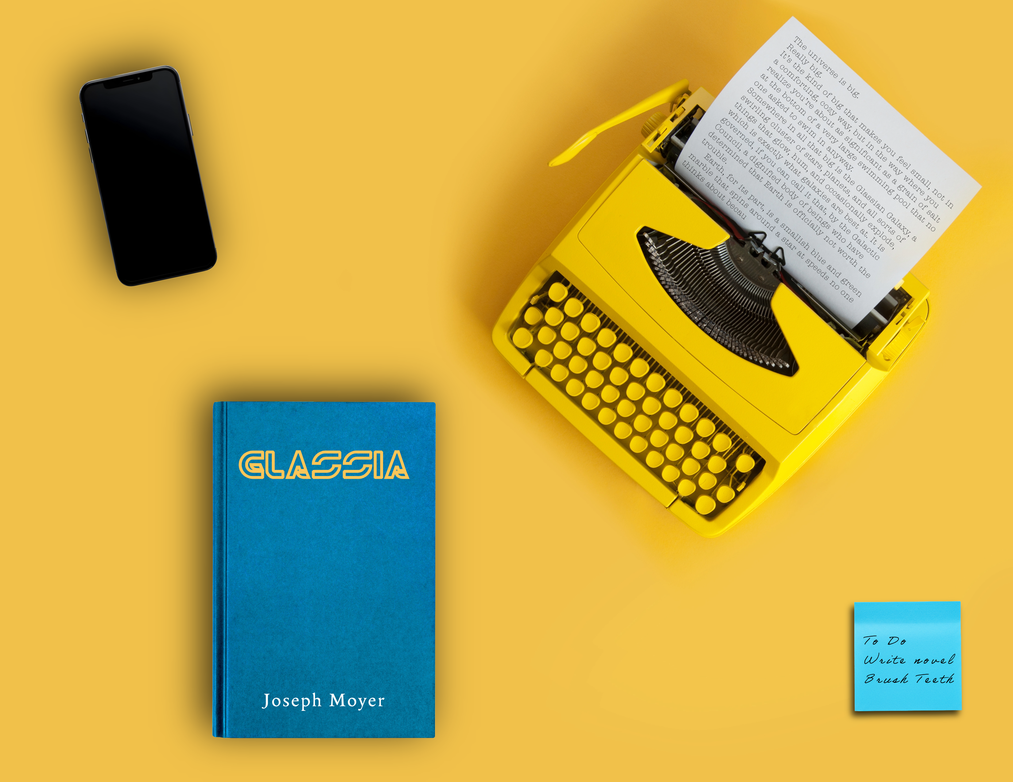 Yellow typewriter and Glassia book.